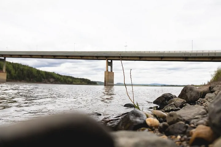Yukon River bridge seen from the gravel shoreline below, the Dalton Highway crossing at milepost 56